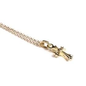 22K guldkors-charm Baby Fat