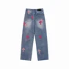 Chrome Hearts rosa Jeans med korslogotyp