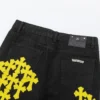 Chrome Hearts slitna gula jeans